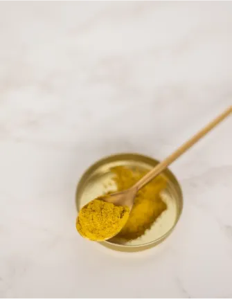 turmeric in a spoon